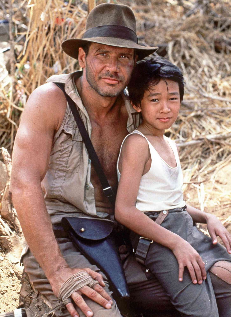 Ke Huy Quan e Harrison Ford em 'Indiana Jones e o Templo da Perdição' (1984)  — Foto: Paramount Pictures e Lucasfilmes/Divulgação
