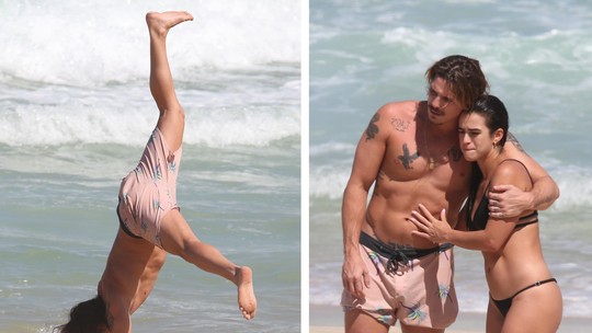 Rômulo Arantes Neto faz acrobacia em dia de praia com a namorada, Mari Saad