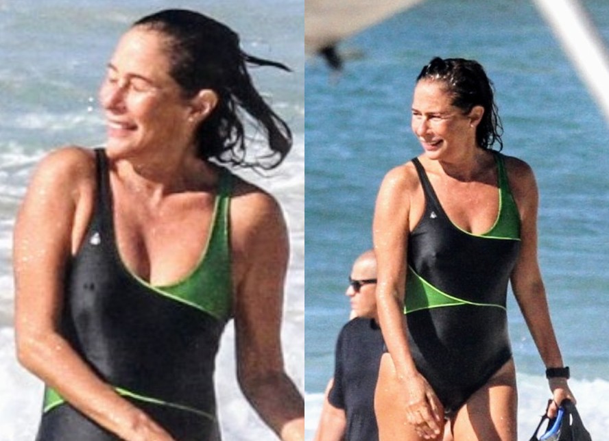 Sorridente, Andrea Beltrão é clicada nadando na praia do Rio de Janeiro