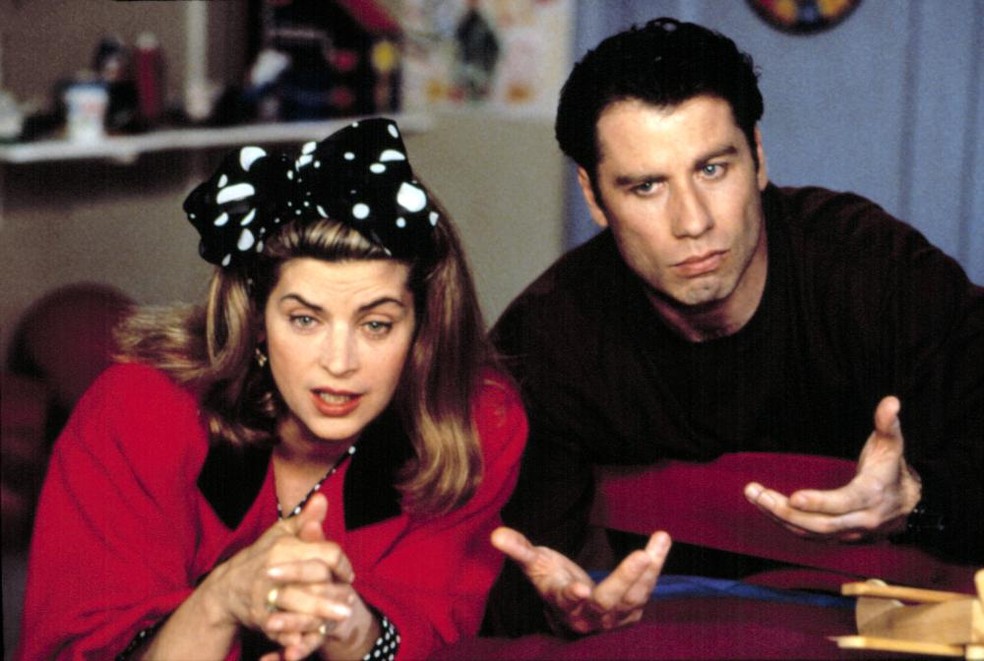 Kirstie Alley e John Travolta em cena de Olha Quem Está Falando (1989) — Foto: Divulgação