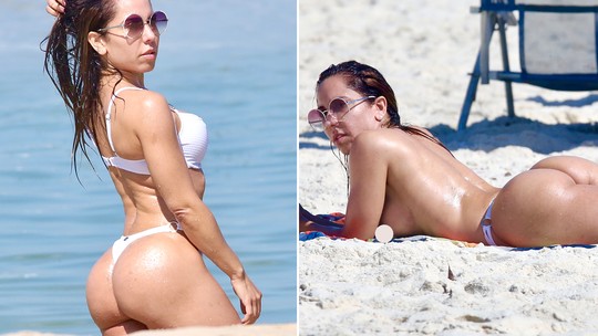 Mulher Melão faz topless em dia de praia no Rio; veja fotos