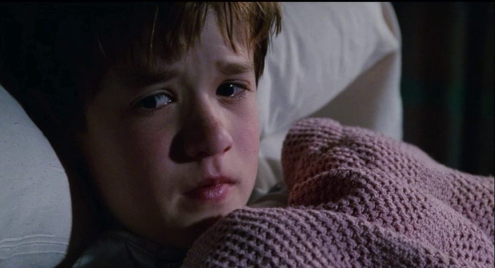 Haley Joel Osment em cena de 'O Sexto Sentido' (1999) &mdash; Foto: Divulga&ccedil;&atilde;o