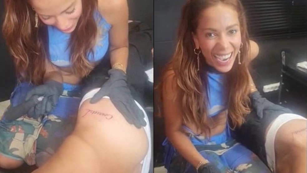 Anitta se diverte ao tatuar Simone Sussina — Foto: Reprodução/Instagram