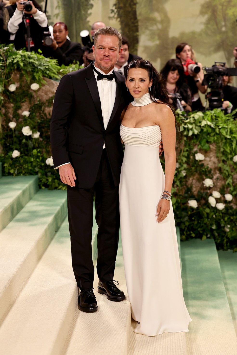 Matt Damon e Luciana Barroso, de Dior — Foto: Getty Images