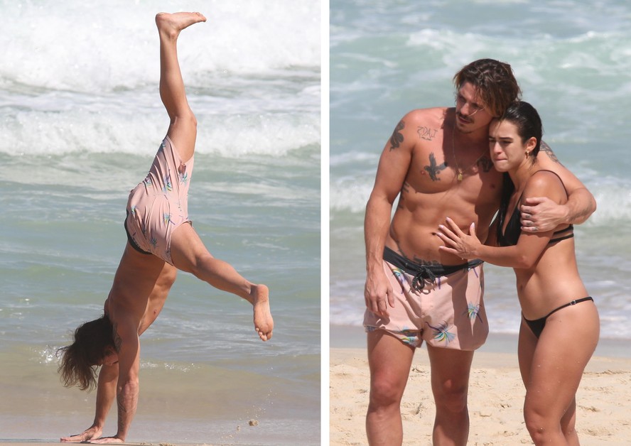 Romulo Arantes Neto faz acrobacia em dia de praia com a namorada, Mari Saad