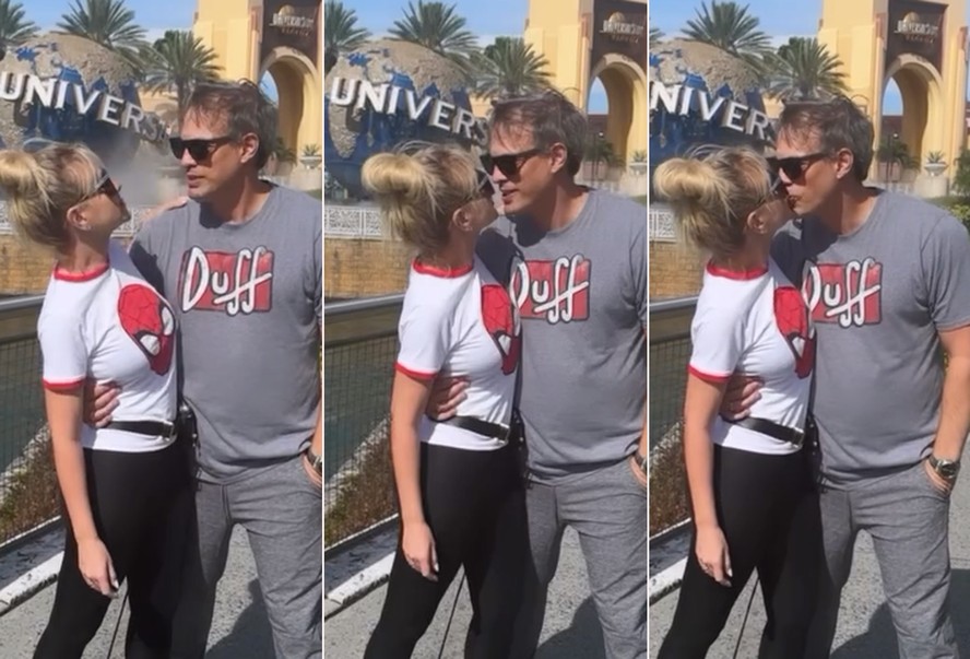 Eliana troca beijos com o marido em parque da Flórida