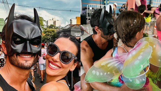 Rodrigo Santoro usa máscara de Batman e cai na folia com Mel Fronckowiak e a filha