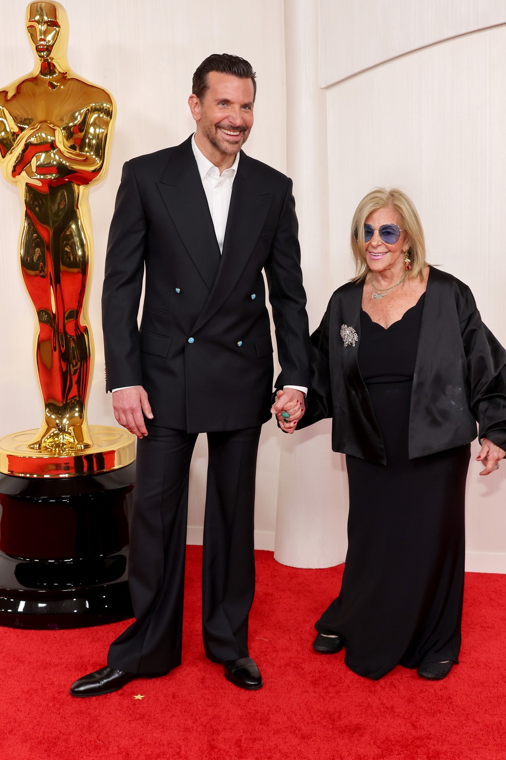 Bradley Cooper e Gloria Campano — Foto: Getty Images