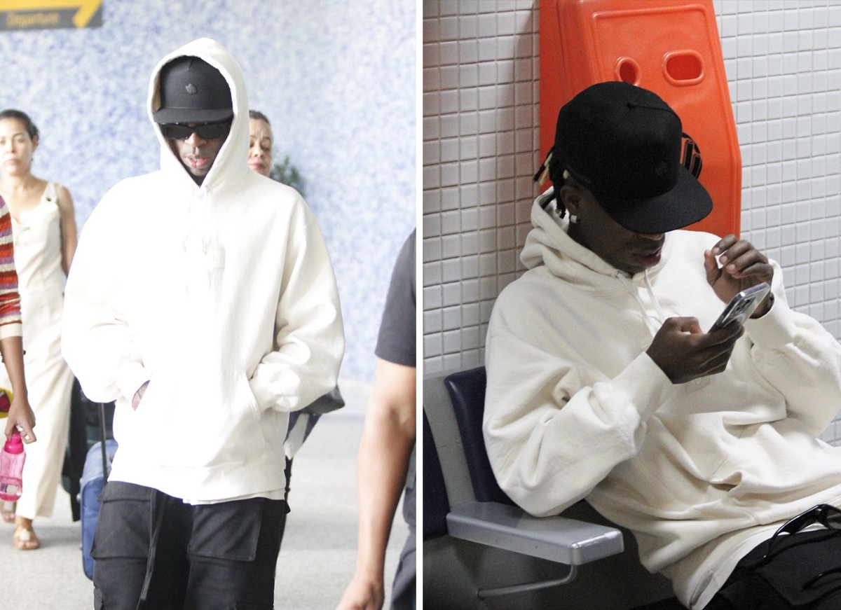 'Disfarçado', jogador Vini Jr. embarca em aeroporto no Rio; fotos