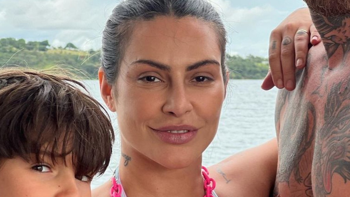Cleo posa com marido e enteado de 9 anos durante passeio em lago; fotos