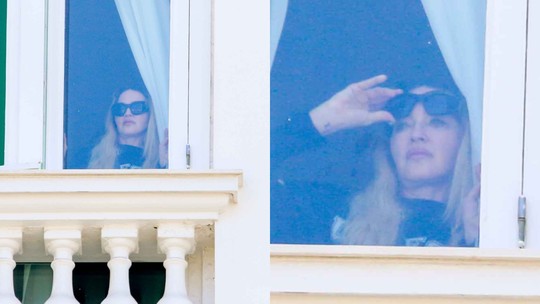 Madonna aparece em janela de hotel, admirando a vista do Rio de Janeiro; veja as fotos