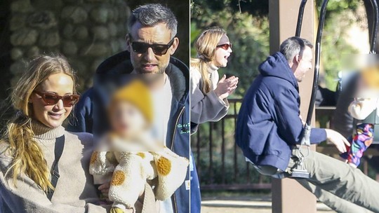 Jennifer Lawrence se diverte em parquinho com o marido e o filho, Cy